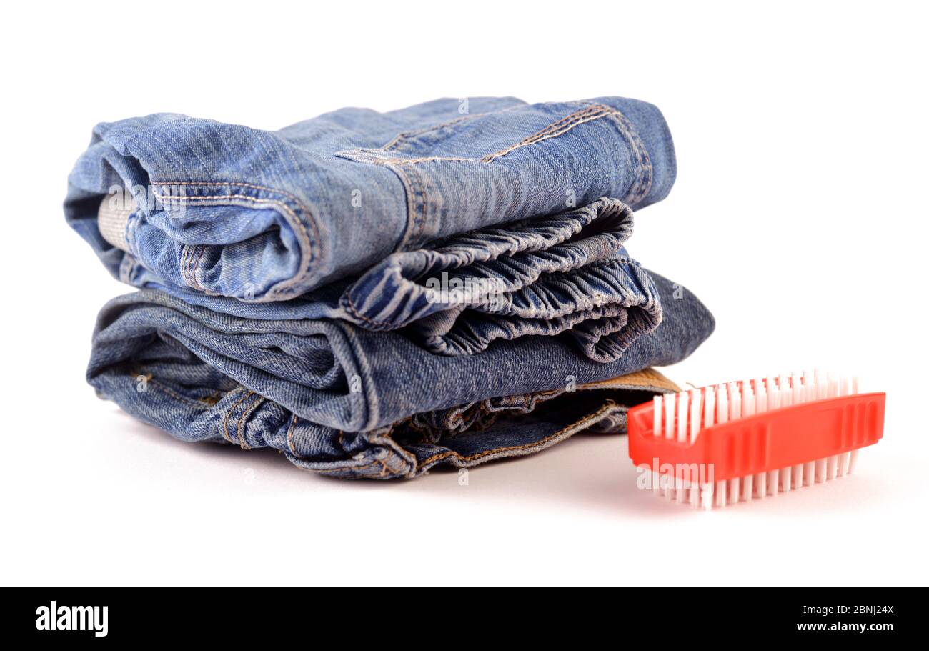 Blue jeans for kids isolated with a red brush Stock Photo