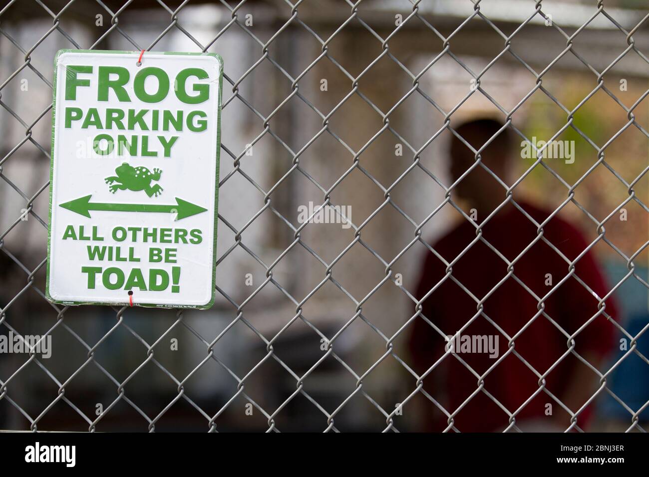 Humorous sign in Cedar Creek Corrections Center 'Frog parking only - all others will be toad'. Prisoners in this facility are raising endangered  Oreg Stock Photo