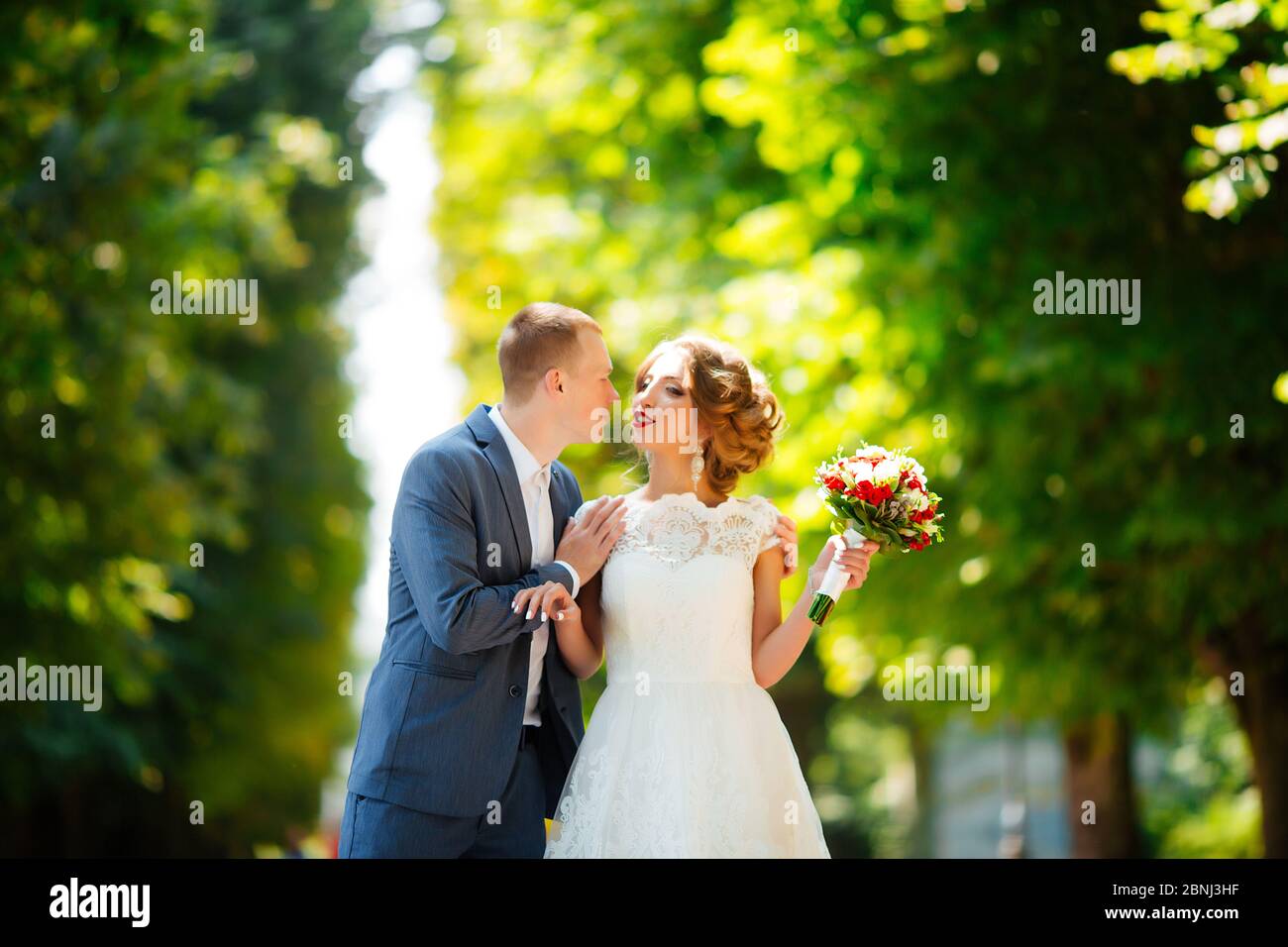 Beautiful bride posing outdoors hi-res stock photography and images - Alamy