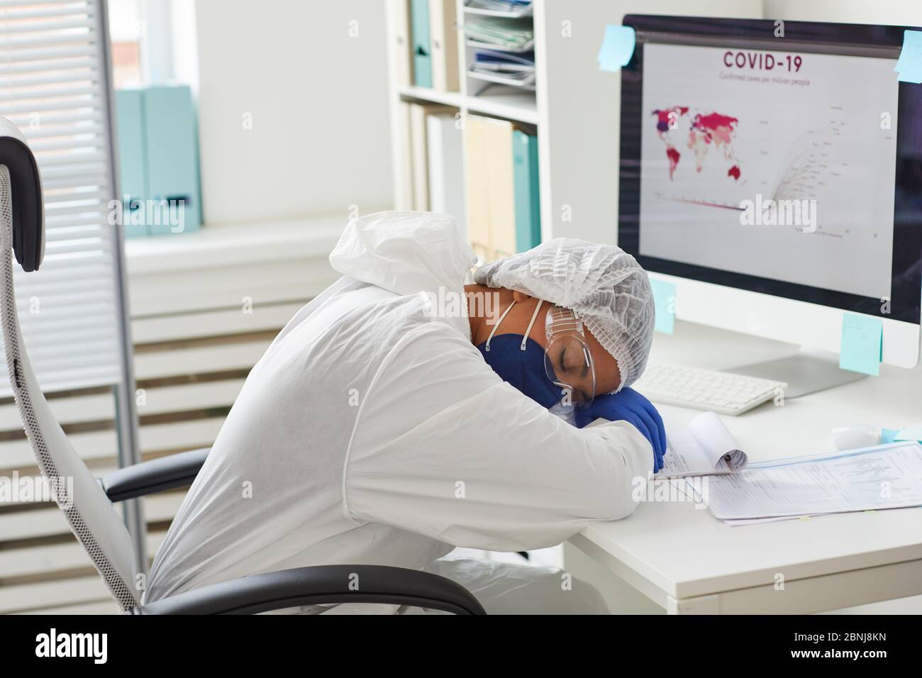 Tired female doctor sleeping in hi-res stock photography and images - Alamy