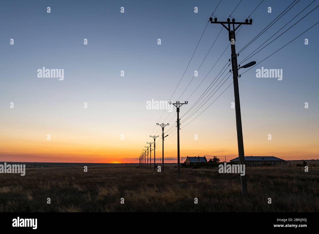 Electric lines at sunset in Elista, Republic of Kalmykia, Russia, Eurasia Stock Photo