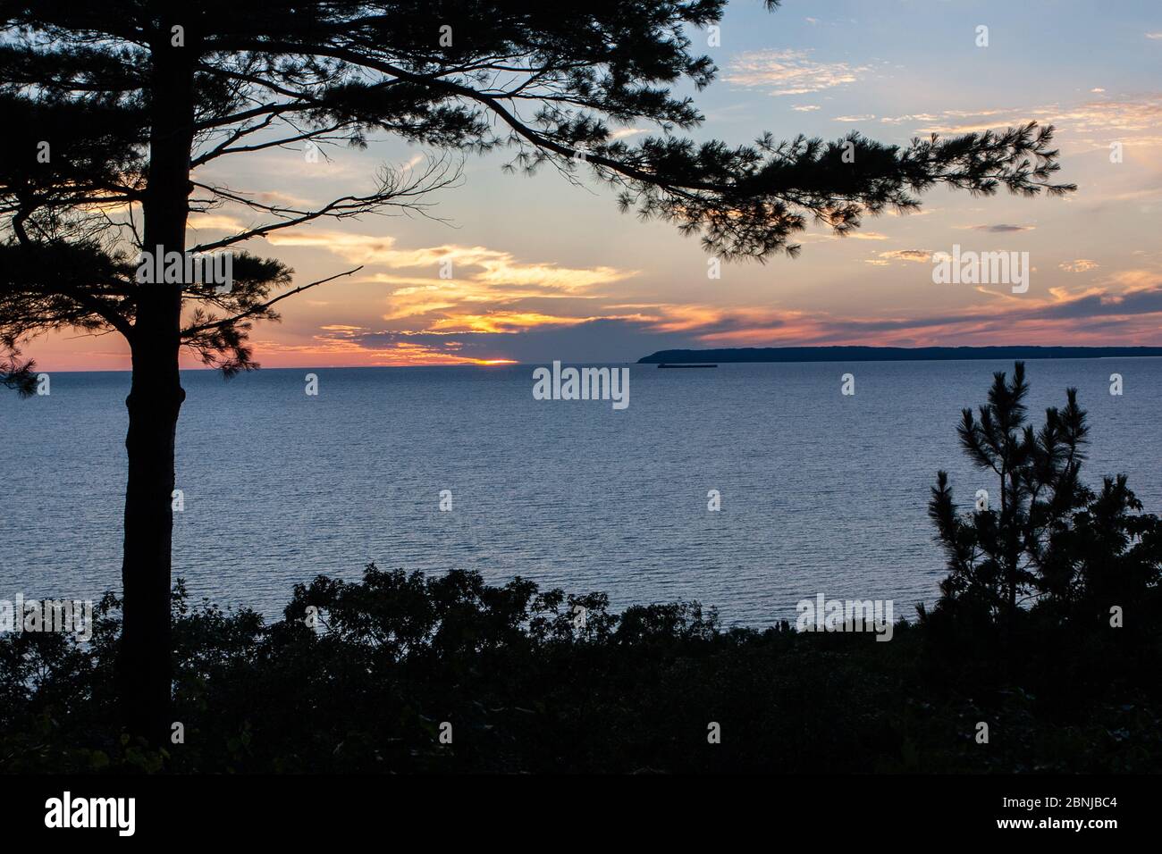 Sunset and South Manatou Island, Sleeping Bear Dunes National Park, Glen Arbor, Michigan, United States of America, North America Stock Photo