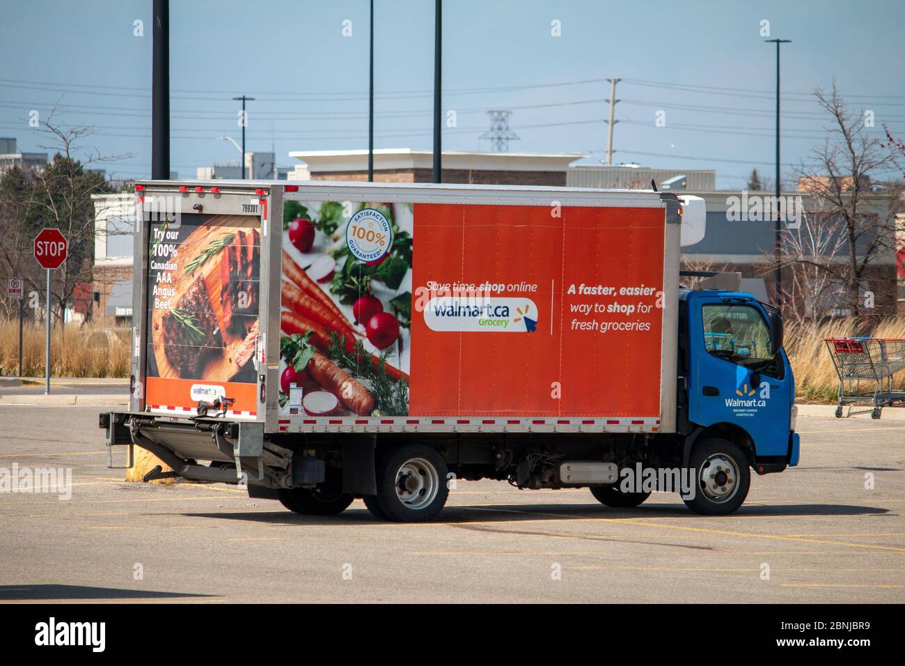 Walmart grocery delivery trucks in a parking lot Stock Photo Alamy