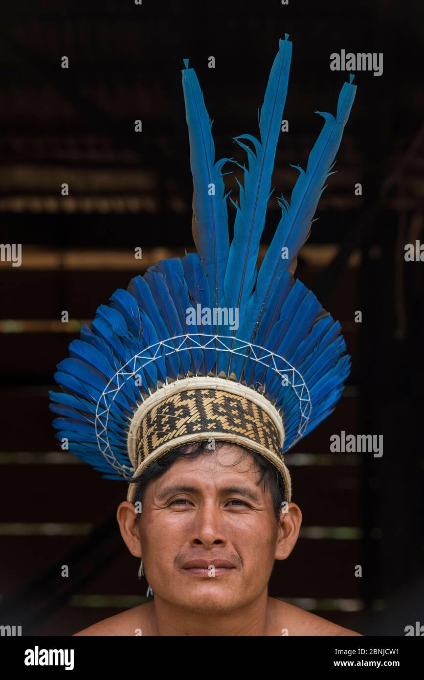 Ami Karamcha wearing macaw feather Wai Wai headdress, Wai Wai territory
