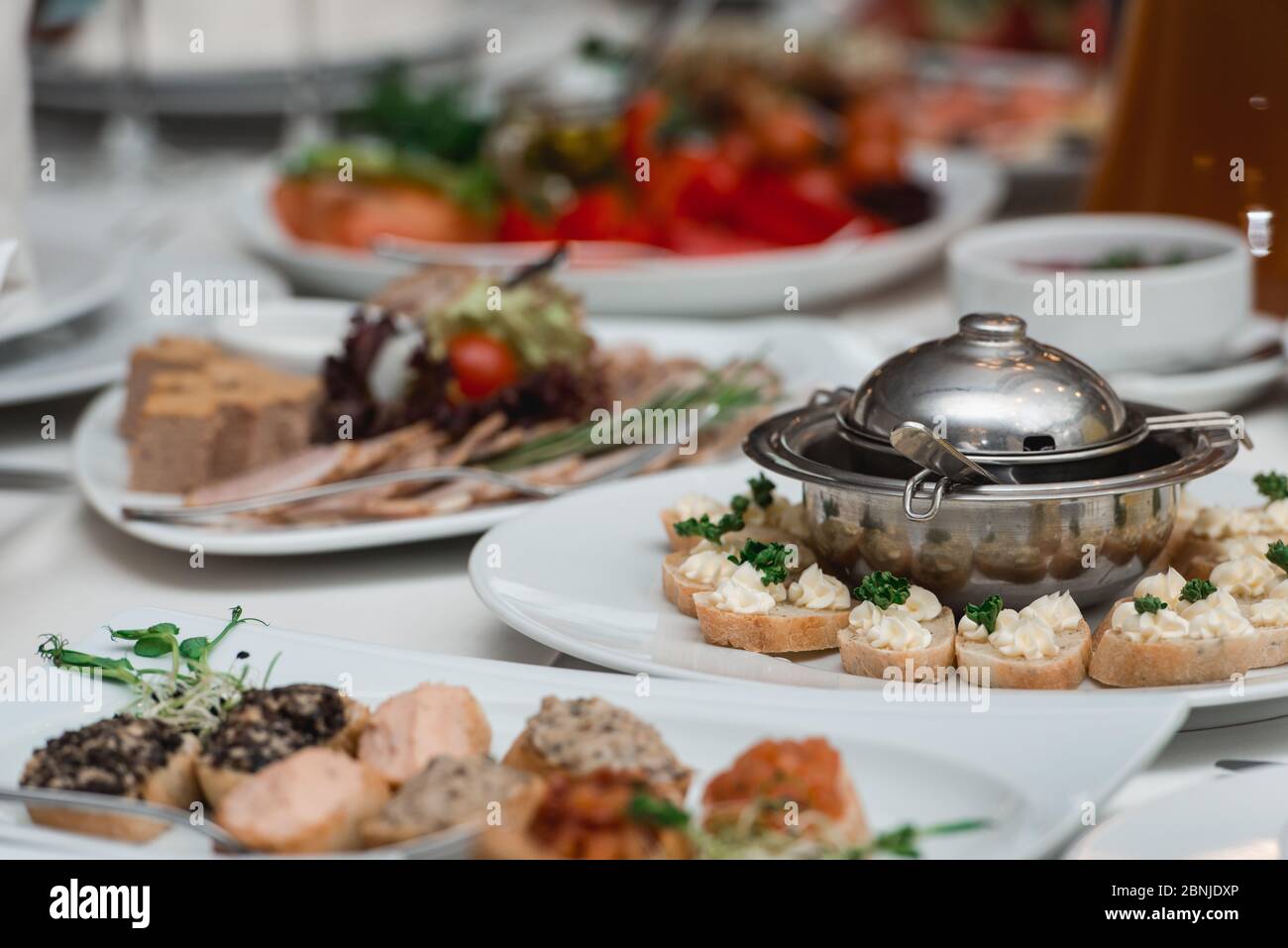 Breads and butter for appetizer. metal plate Stock Photo Alamy