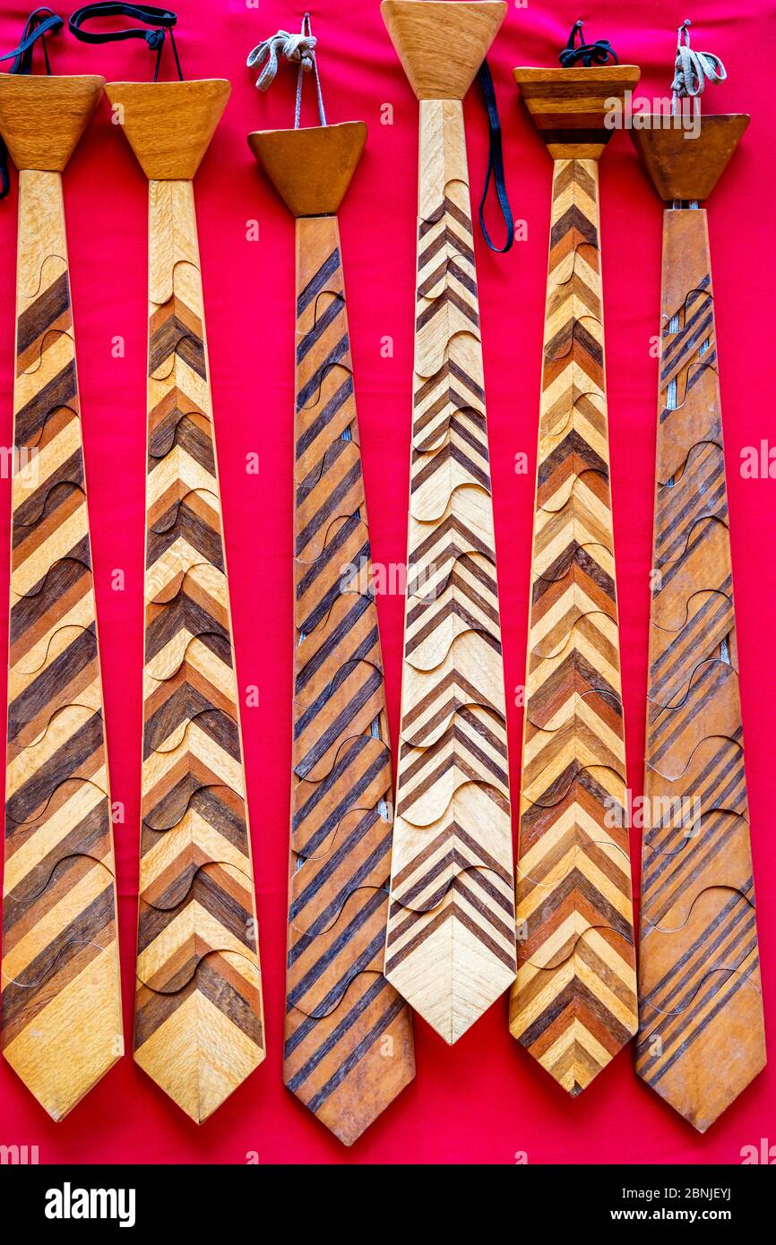 Woodan Tie Hanging on the wall. Wooden Striped Tie,Souvenir Tie Stock Photo