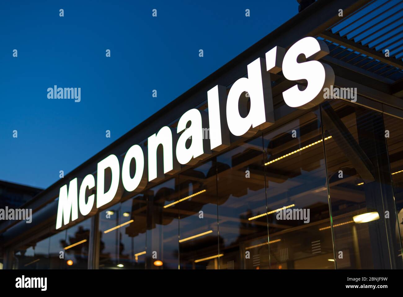 McDonald's fast food restaurant logo seen in Imperia, Liguria region, Italy Stock Photo