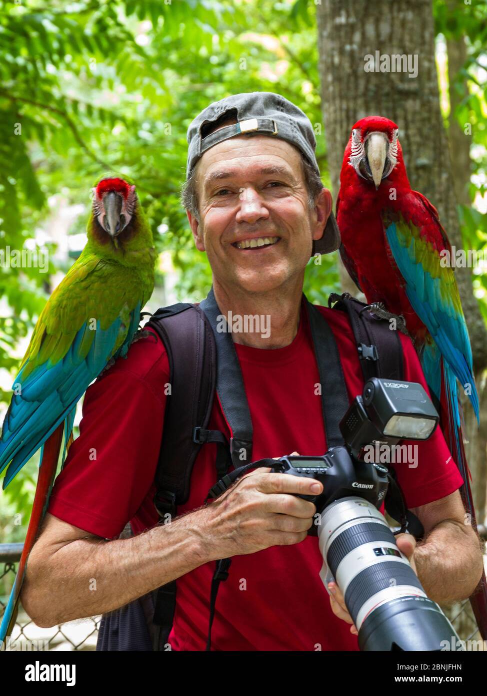 German wildlife photographer Konrad Wothe with Military macaw (Ara