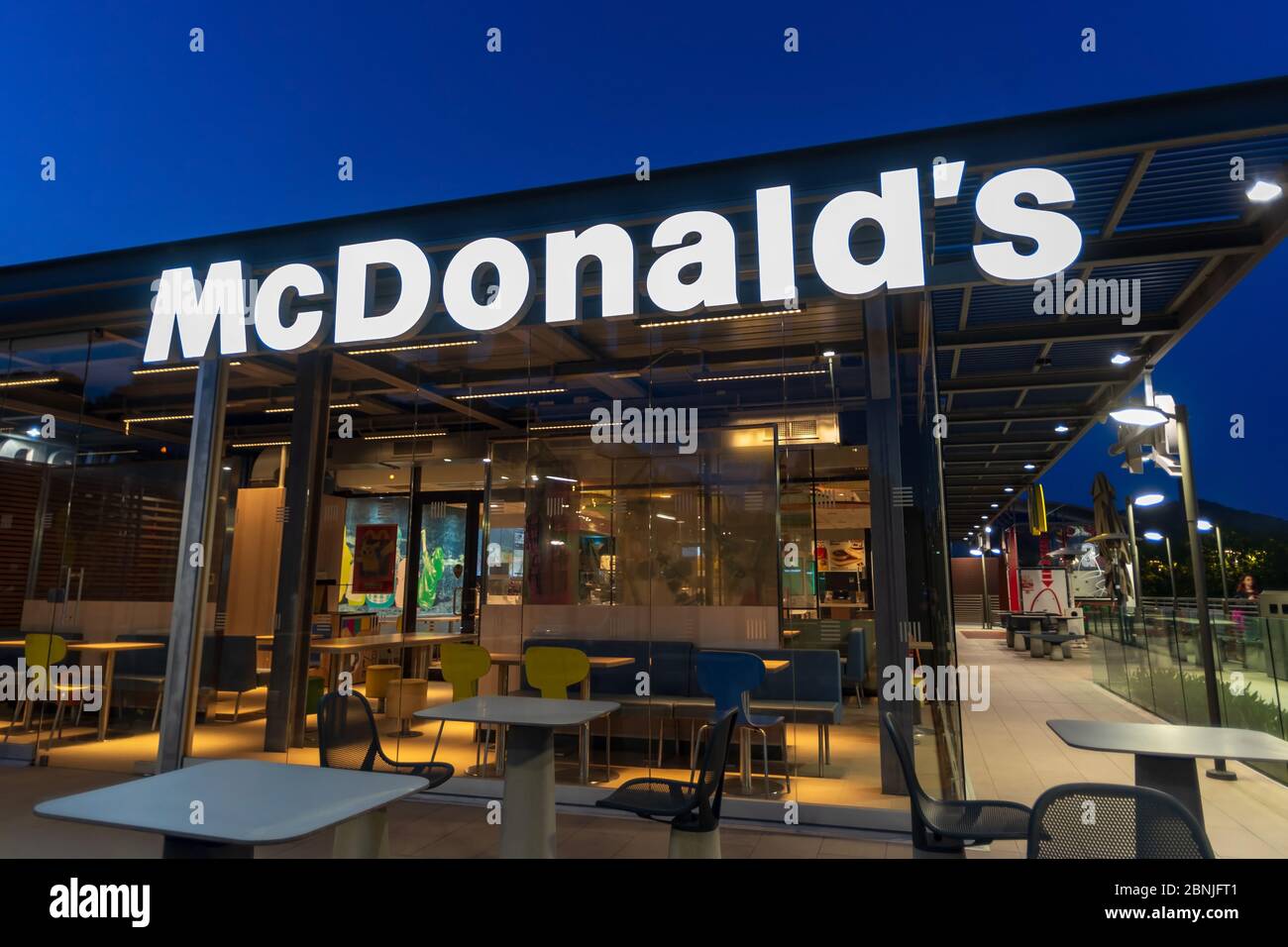 Outside Of A McDonald s Fast Food Restaurant At Night In Imperia Italy Stock Photo Alamy