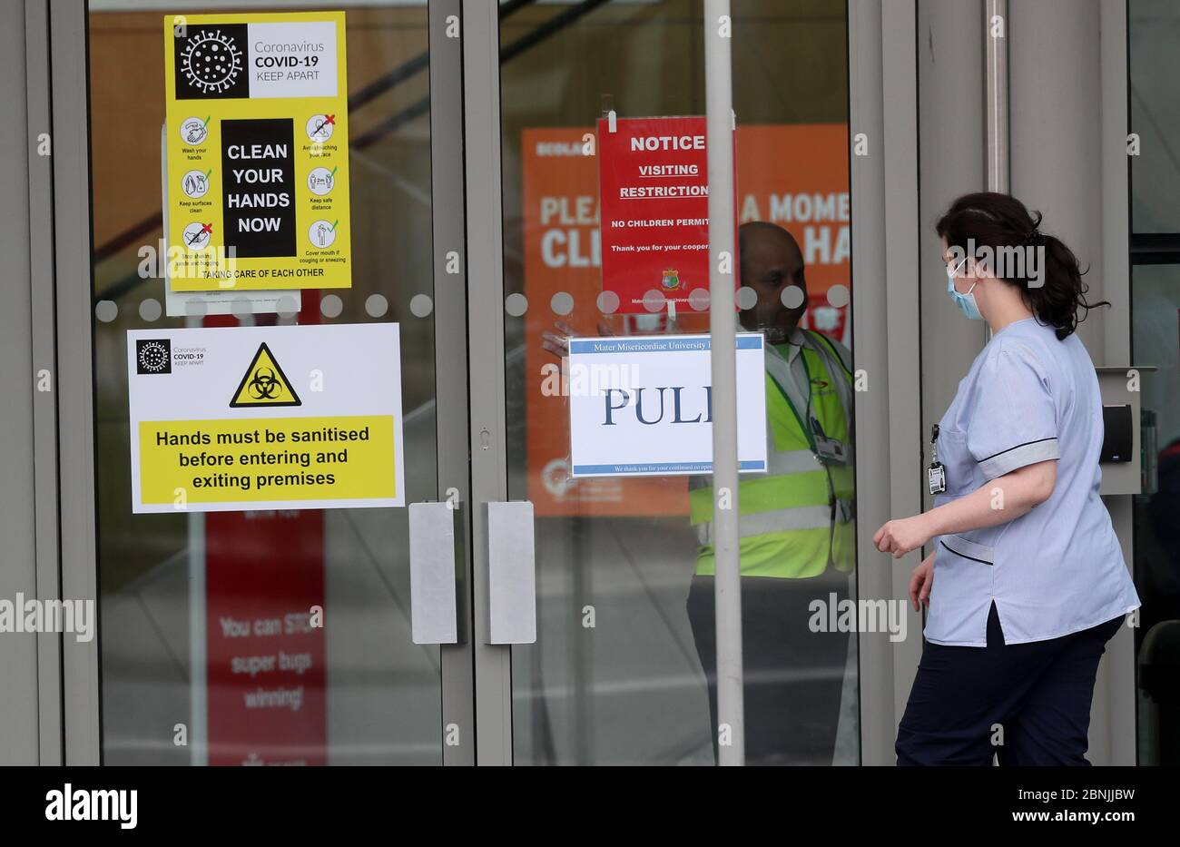 Hospital staff at the entrance to the Mater Hospital in Dublin. Stock Photo