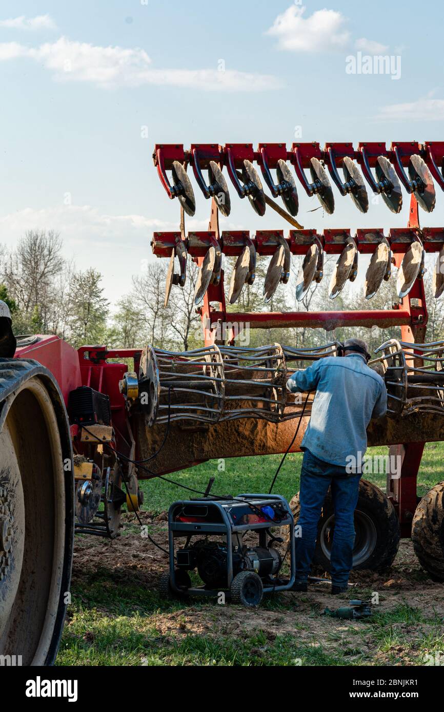 The farmer repairs the harrows if they are damaged by hitting stones. A