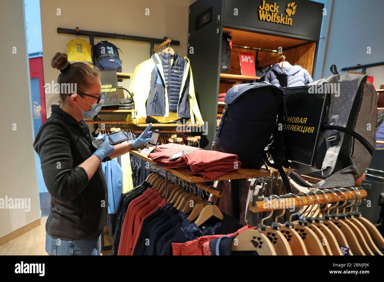 Leningrad Region, Russia. 15th May, 2020. A seller in a shop of the Jack  Wolfskin retail