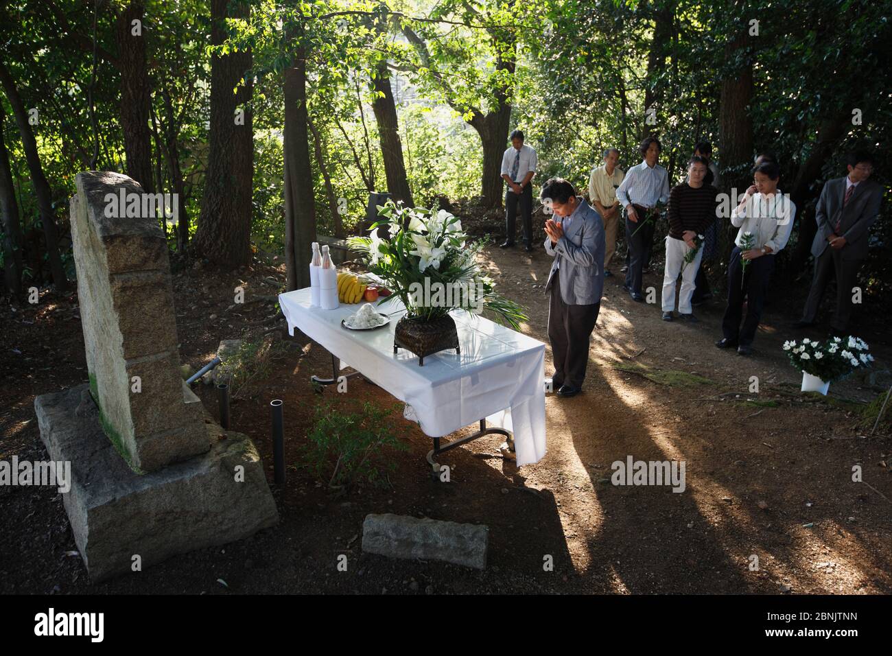 Ceremony and ritual offering to pay tribute to the Chimpanzees which died during scientific experiments into intelligence. These Chimps died of diseas Stock Photo