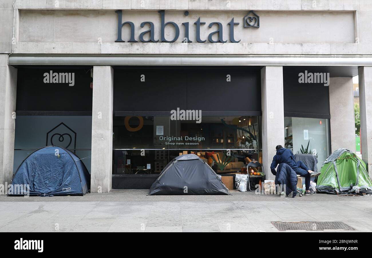 Homeless people's tents erected outside a furniture store in Tottenham Court Road, London, after the introduction of measures to bring the country out of lockdown. Stock Photo