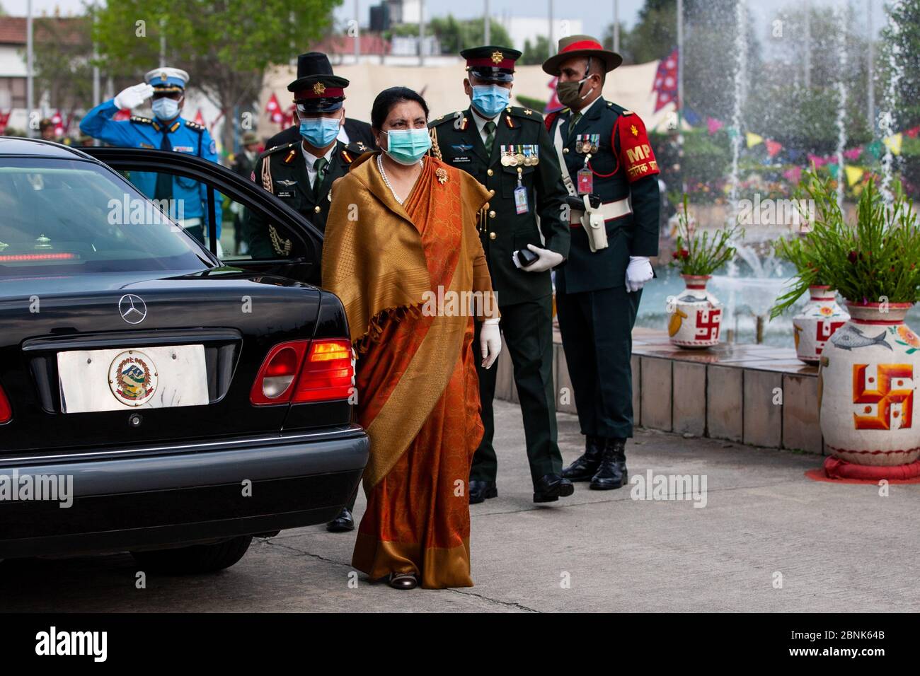 Nepal's President Bidhya Devi Bhandari arrives for the presentation of the government's policies and programs for the upcoming fiscal year while wearing a face mask as a preventive measure at the parliament during the Coronavirus (COVID-19) lockdown crisis.Nepal has so far confirmed 278 coronavirus cases with 35 recovered. Stock Photo