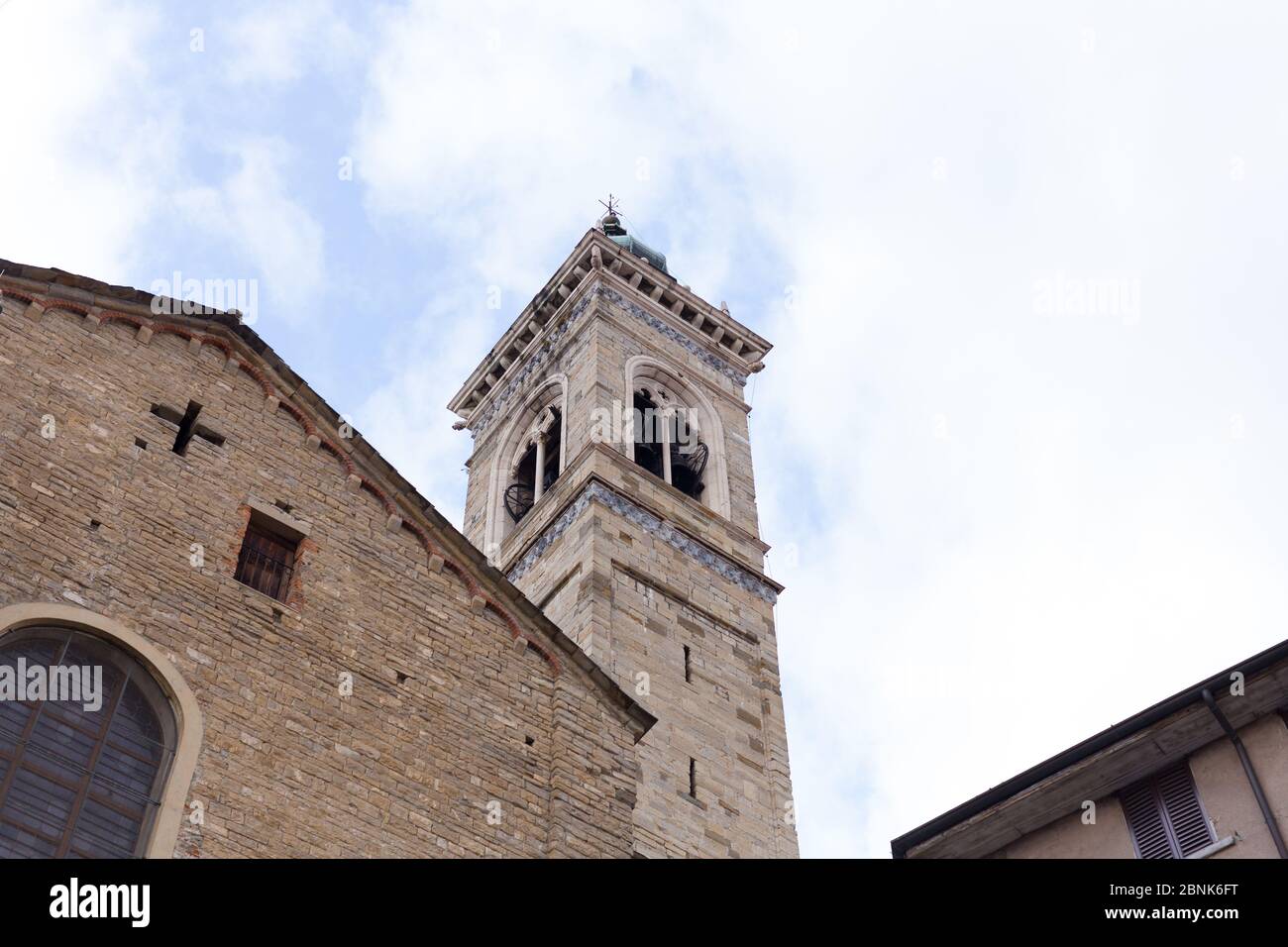 Rectangular Churches Rectangular catholic church bell tower with cross carved in white ...