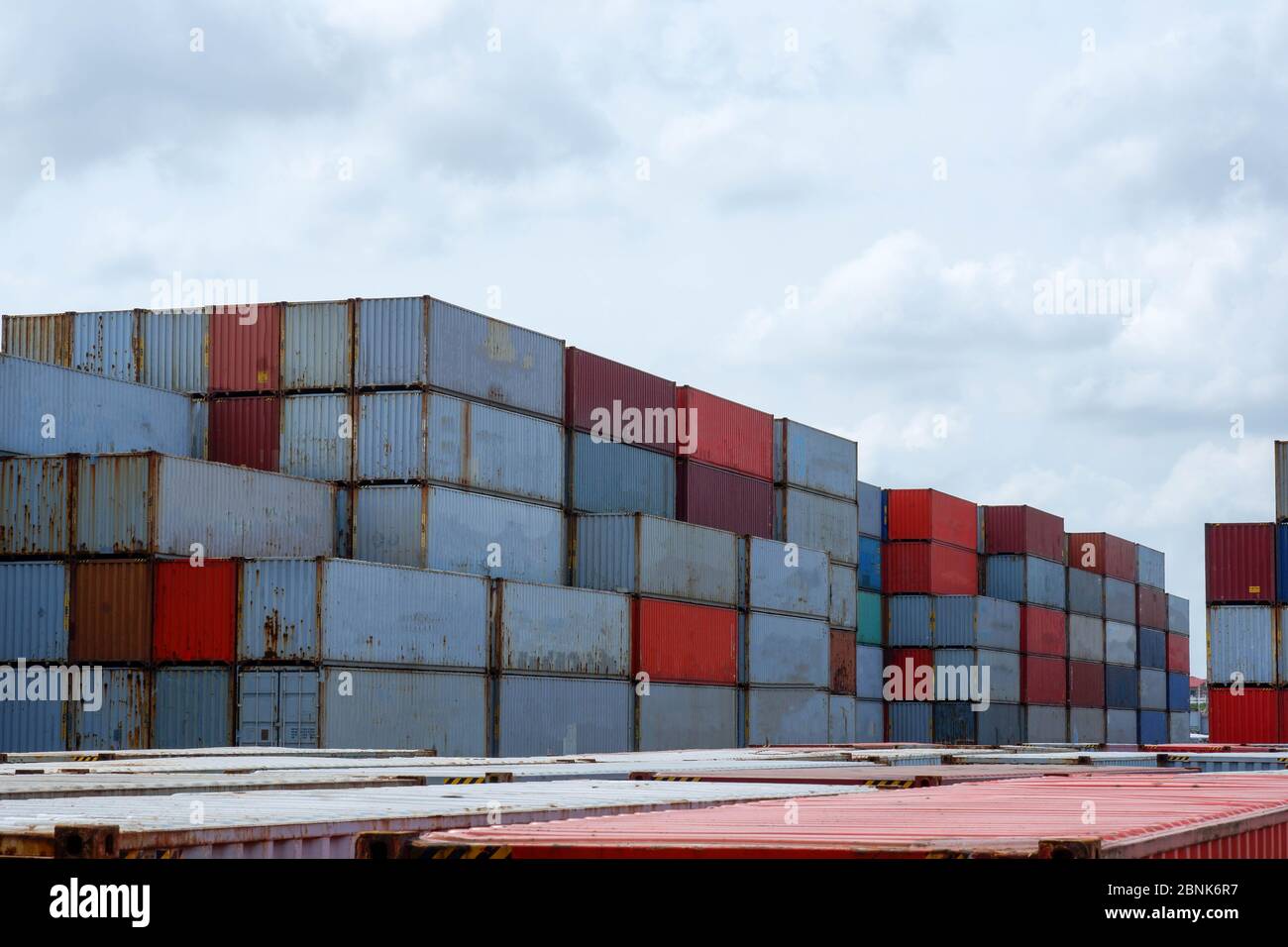 Container stack In exports and imports Stock Photo - Alamy