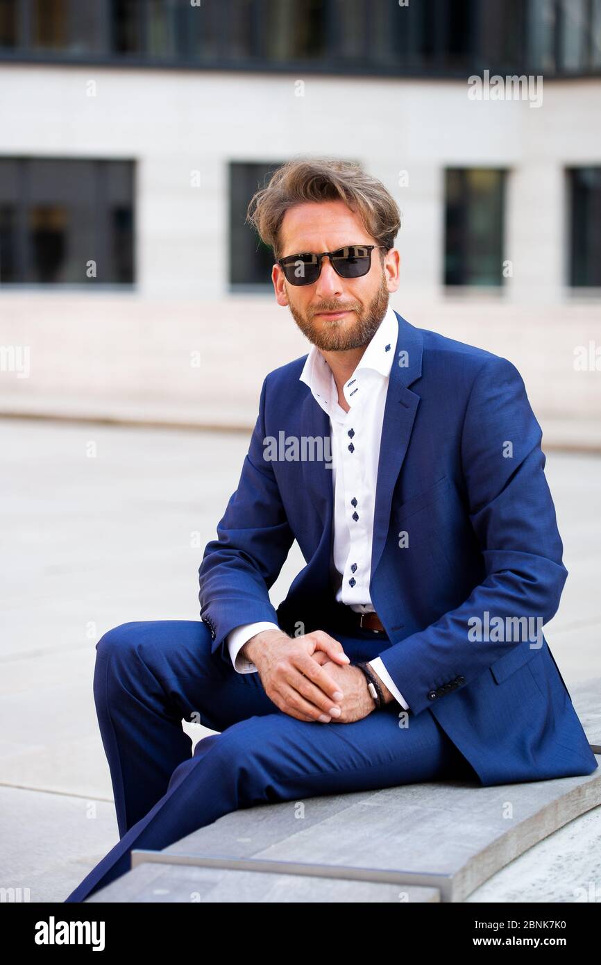 man in suit wearing sunglasses Stock Photo