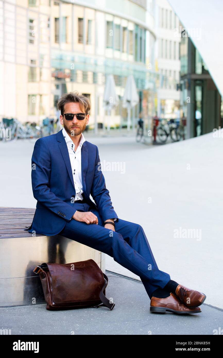 man in suit wearing sunglasses Stock Photo