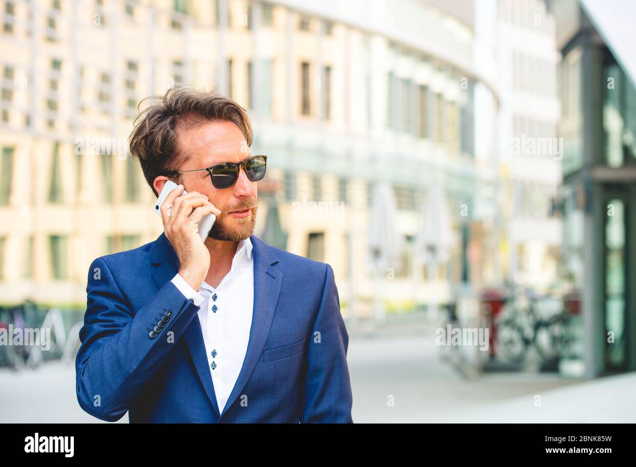 man working outside in Frankfurt Main, Germany Stock Photo