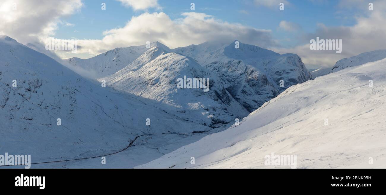 Panorama of Bidean nam Bian massif in full winter conditions. Glen Coe, Highlands of Scotland, UK, January 2016. Stock Photo