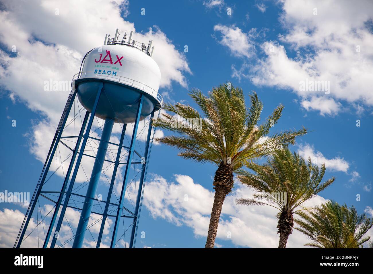 Photo of the Jacksonville Beach FL water tower with palm trees Stock
