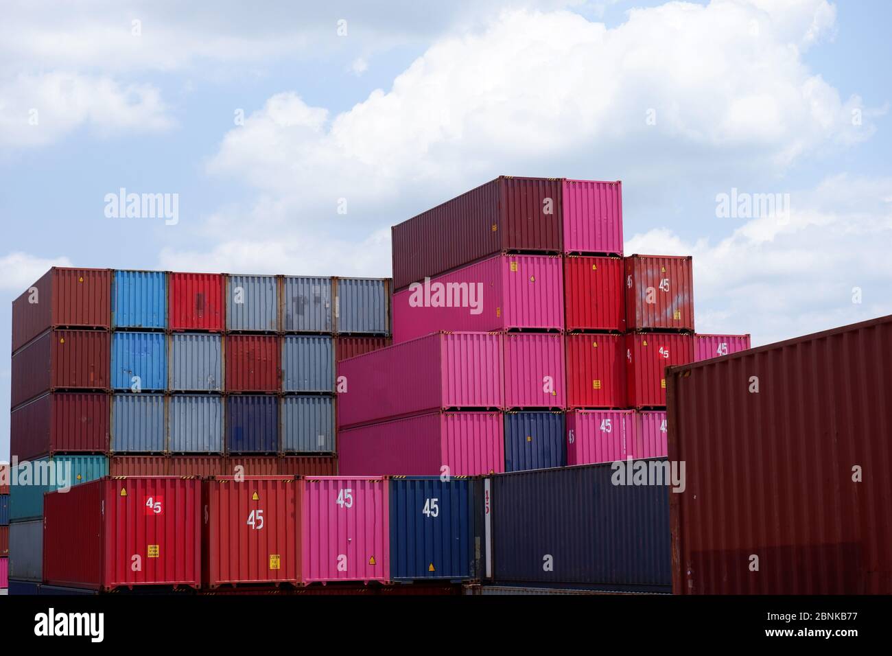 Container stack In exports and imports Stock Photo - Alamy