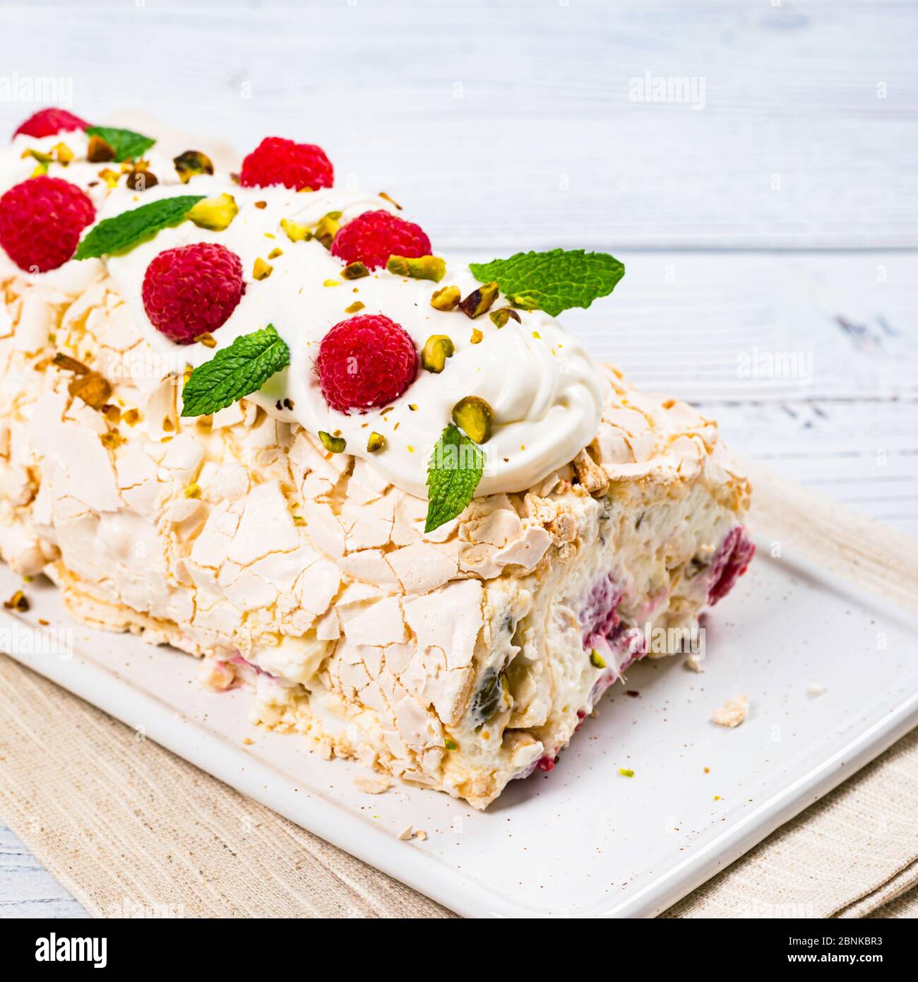 Meringue Roll Cake Pavlova with Cream and Raspberries. Meringue Roulade,  Summer Dessert Stock Photo - Alamy