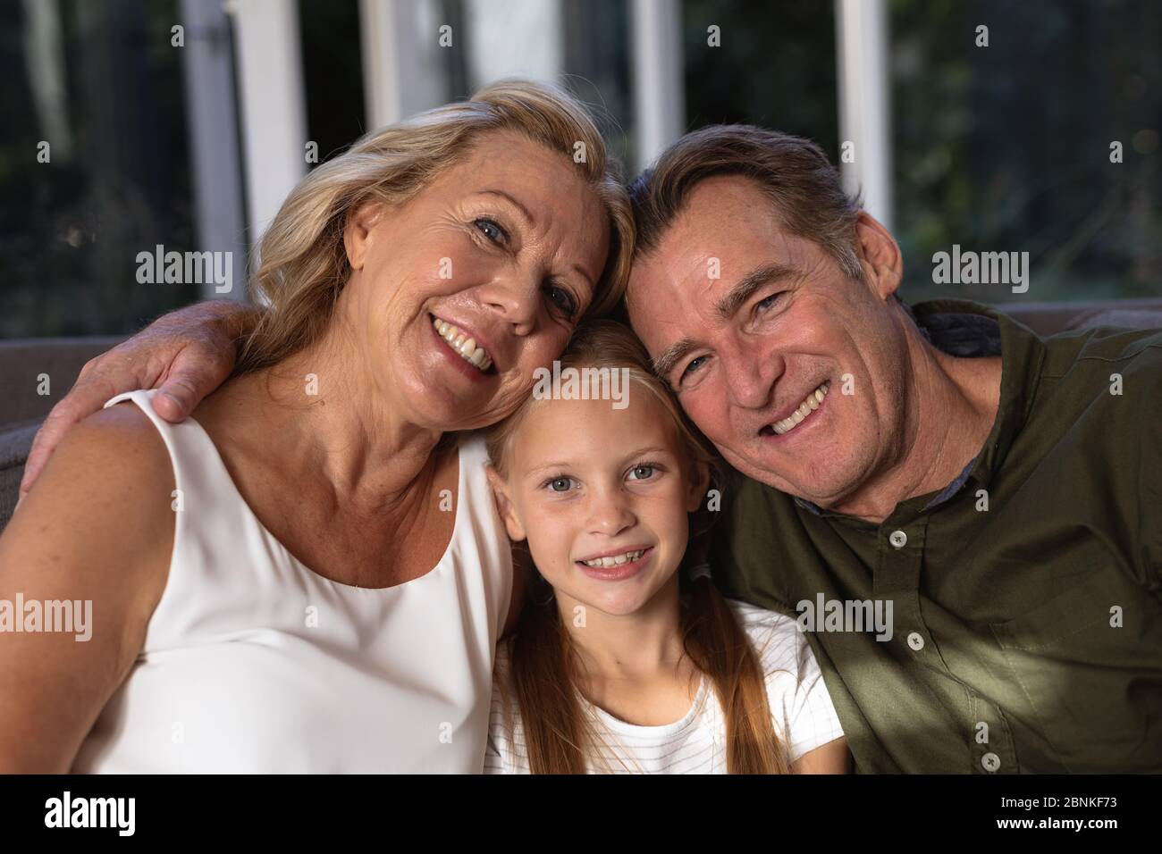 Portrait of a Caucasian girl and her grandparent Stock Photo