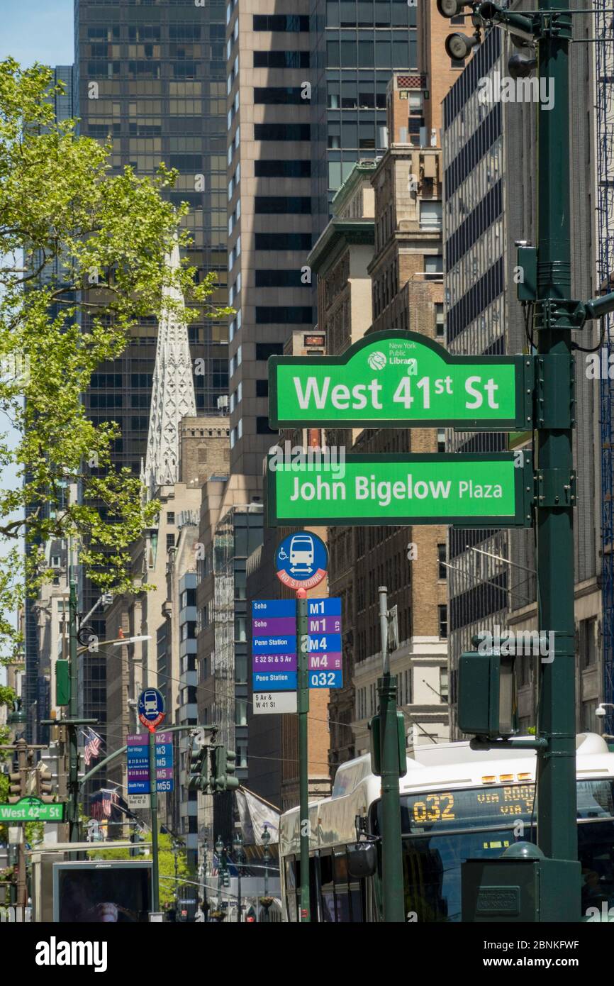 Street Signs on Fifth Avenue outside the main public library in Midtown Manhattan, New York City, USA Stock Photo