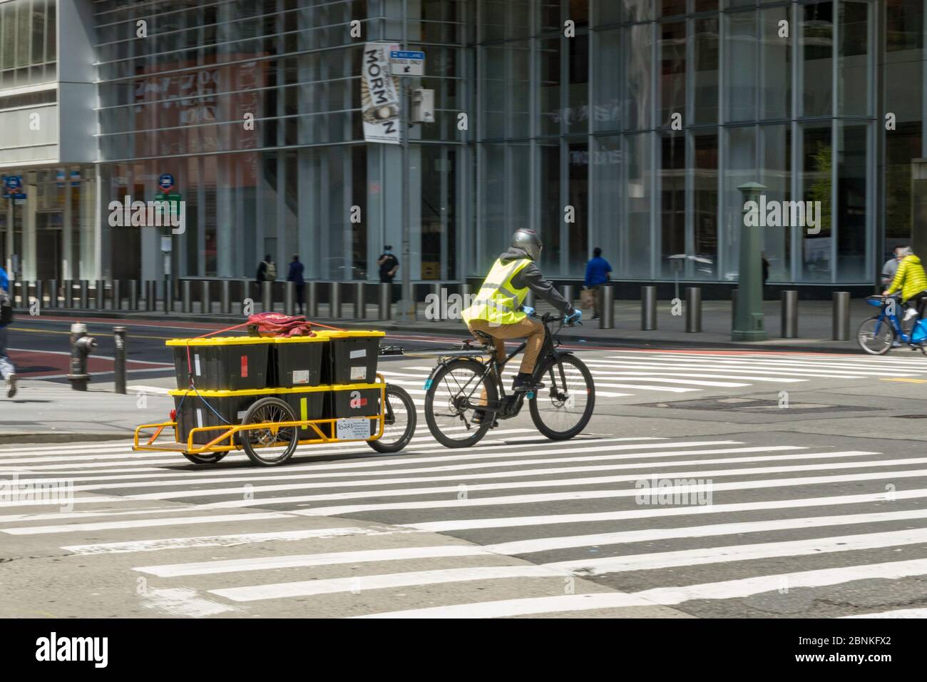 Whole Foods Market employs Carla Cargo trailer with ebike for food delivery in Midtown
