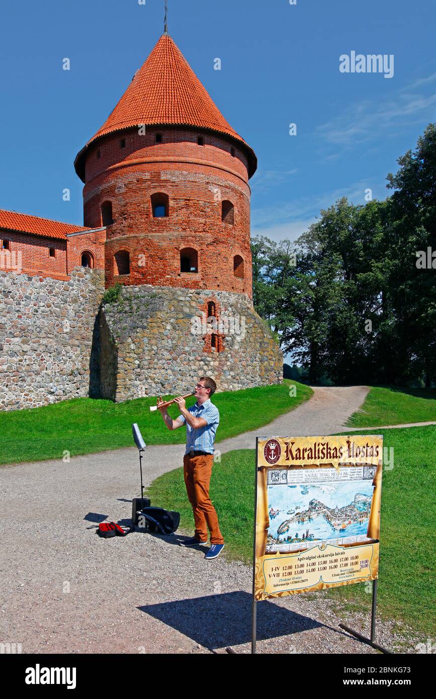 Baltic States, Lithuania, Trakei, Wasserburg, defensive tower, wall, clarinetist Stock Photo