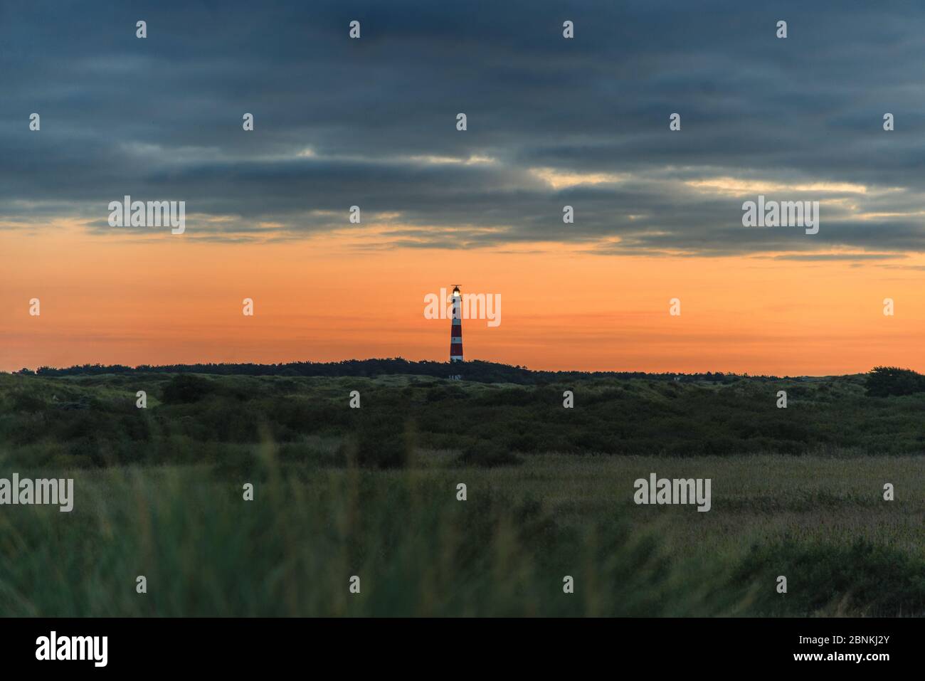 Lighthouse on Ameland against an evening sky Stock Photo