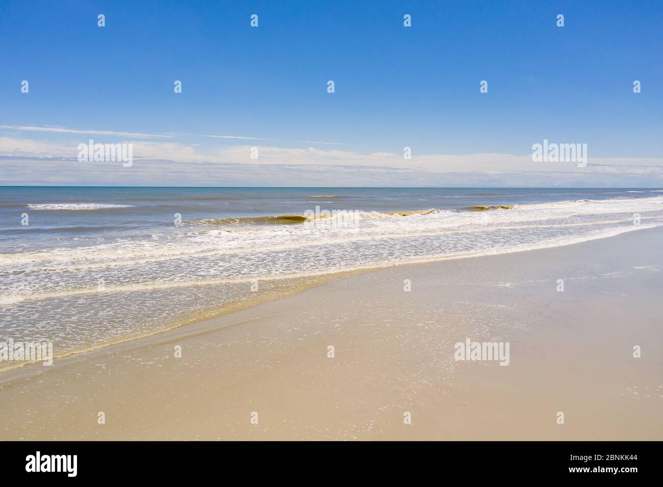 Photo of ocean waves crashing on shore Jacksonville Beach FL Stock Photo