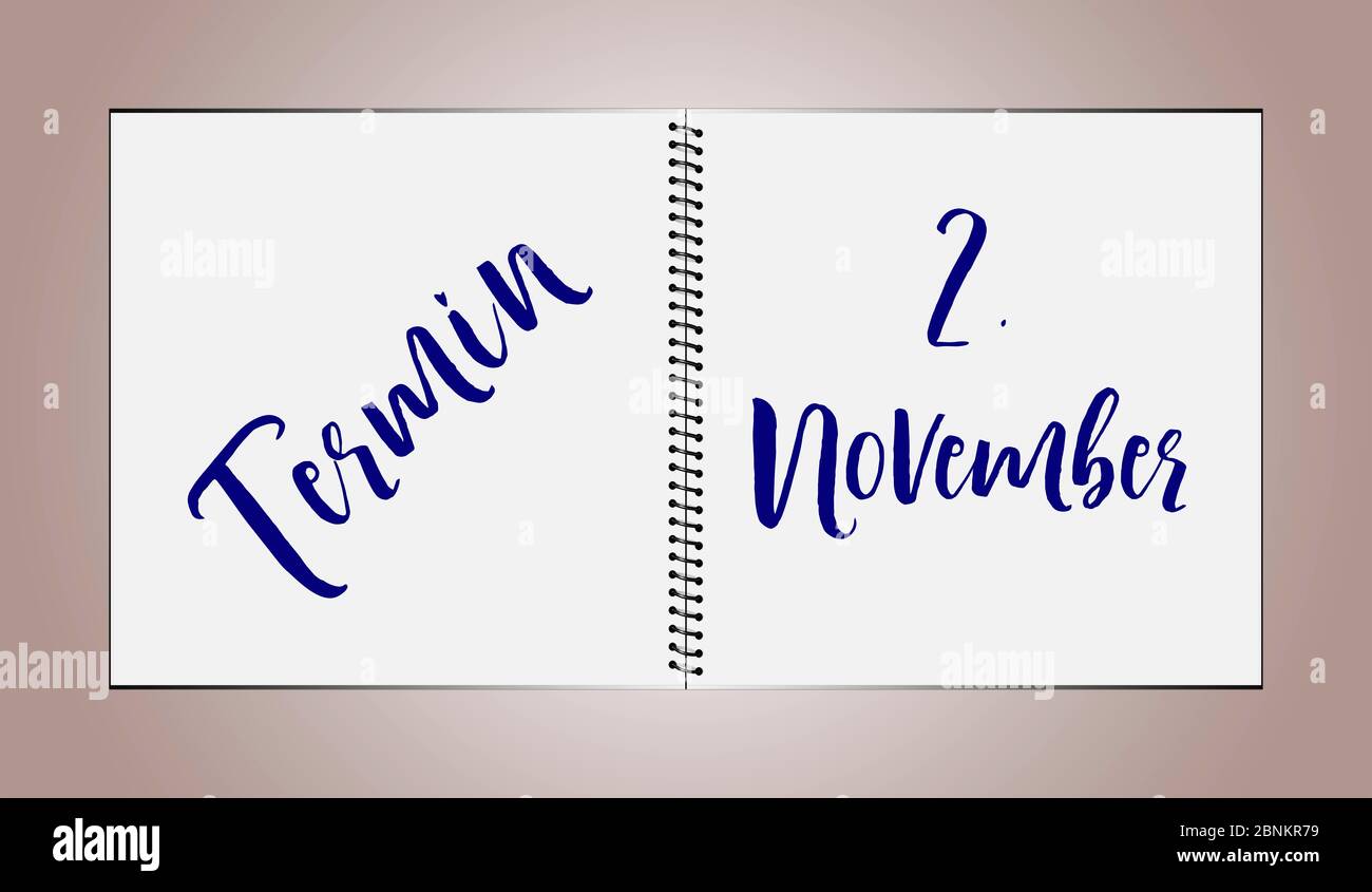 A desk diary shows the date November 2nd Stock Photo