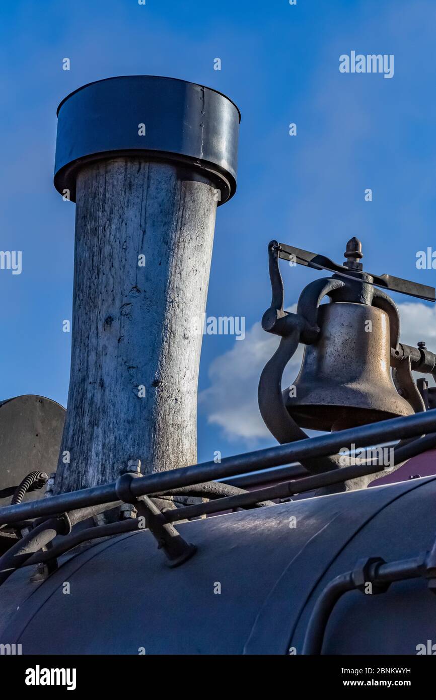 Spark arrestor and smokestake and bell on ocomotive ready for a run at the Chama Station of the Cumbres & Toltec Scenic Railroad in Chama, New Mexico, Stock Photo