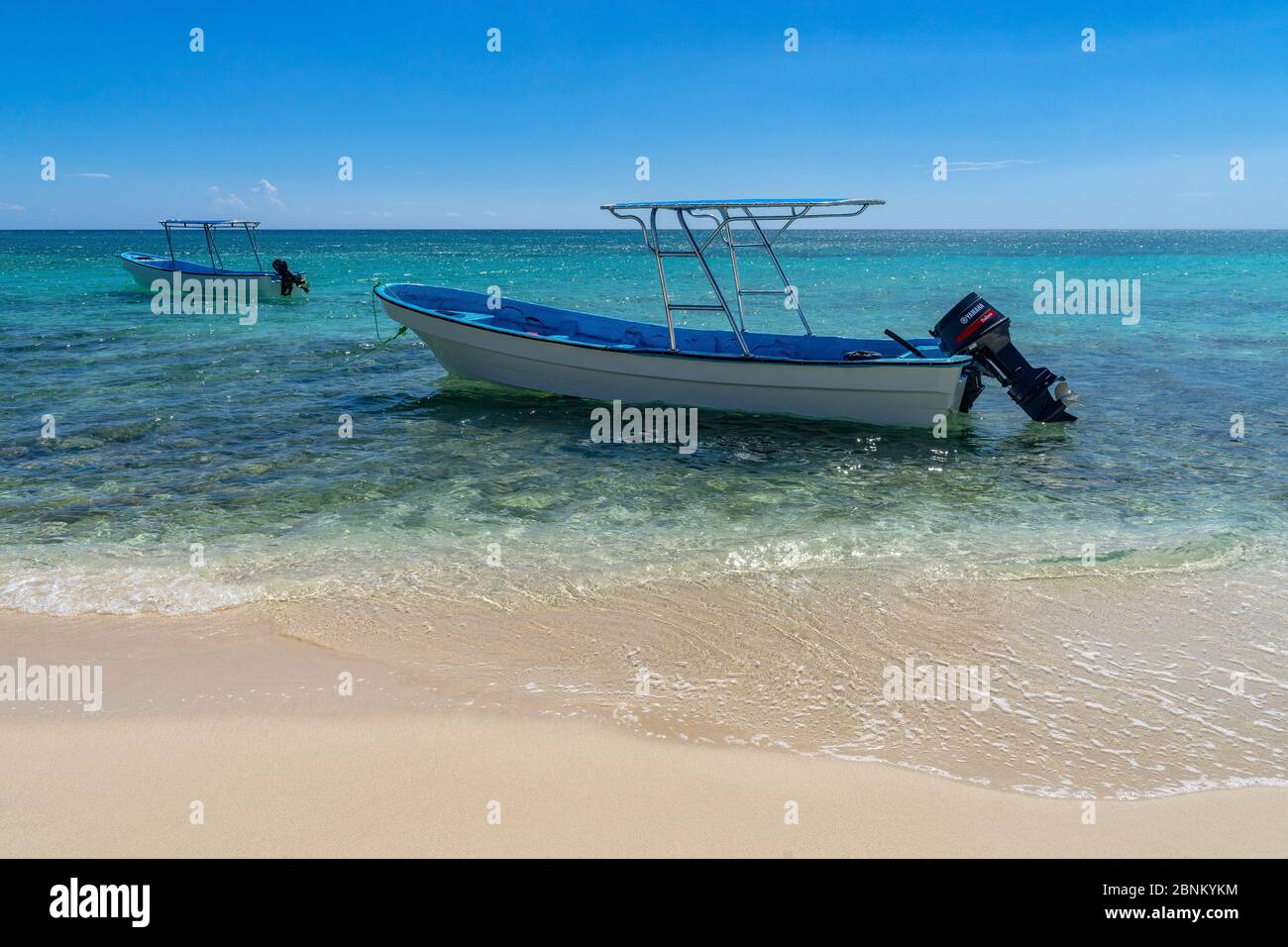 America, Caribbean, Greater Antilles, Dominican Republic, Pedernales, excursion boats in front of the dream beach of the Bahía de las Aguilas Stock Photo
