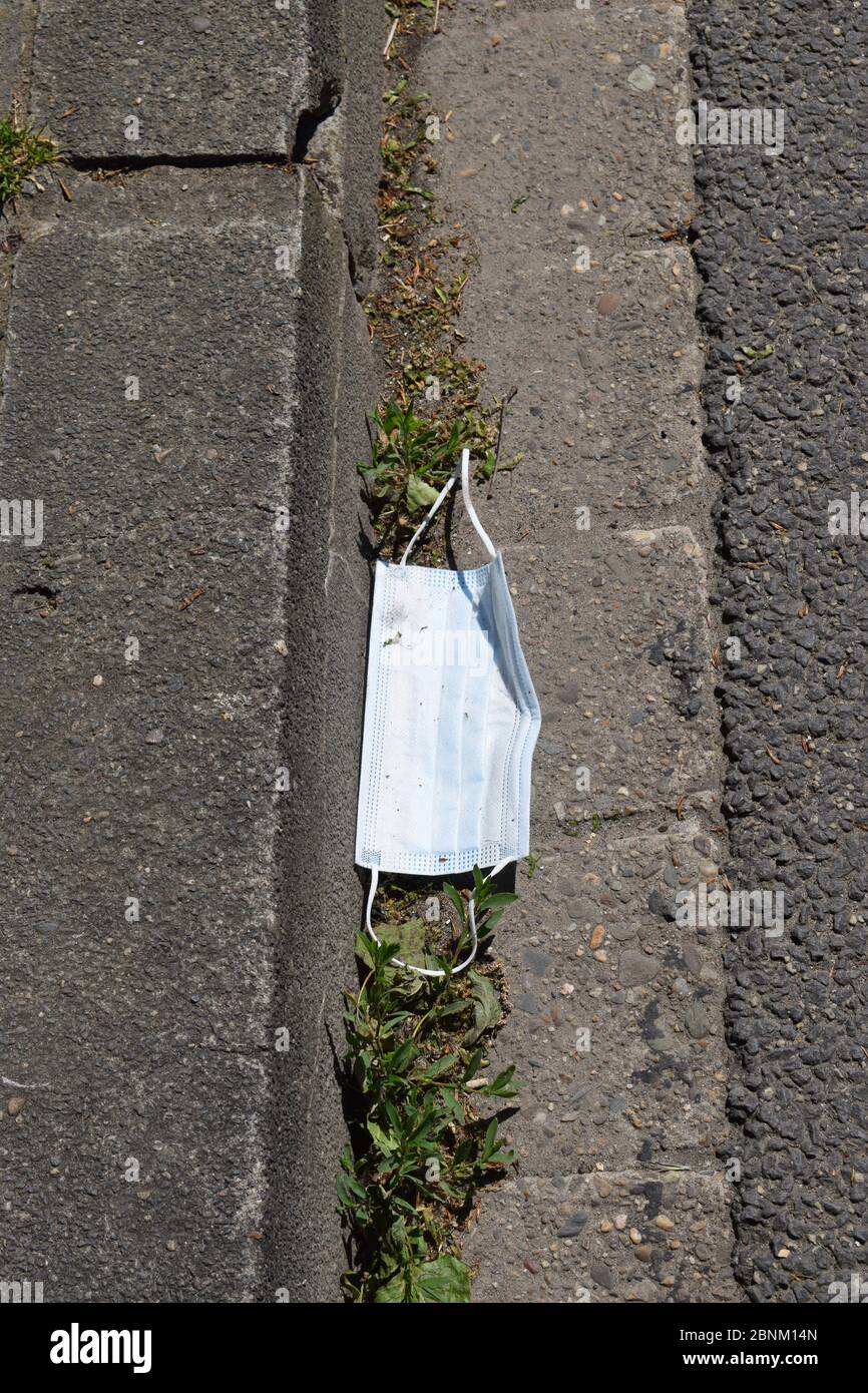 thrown away mask Stock Photo Alamy
