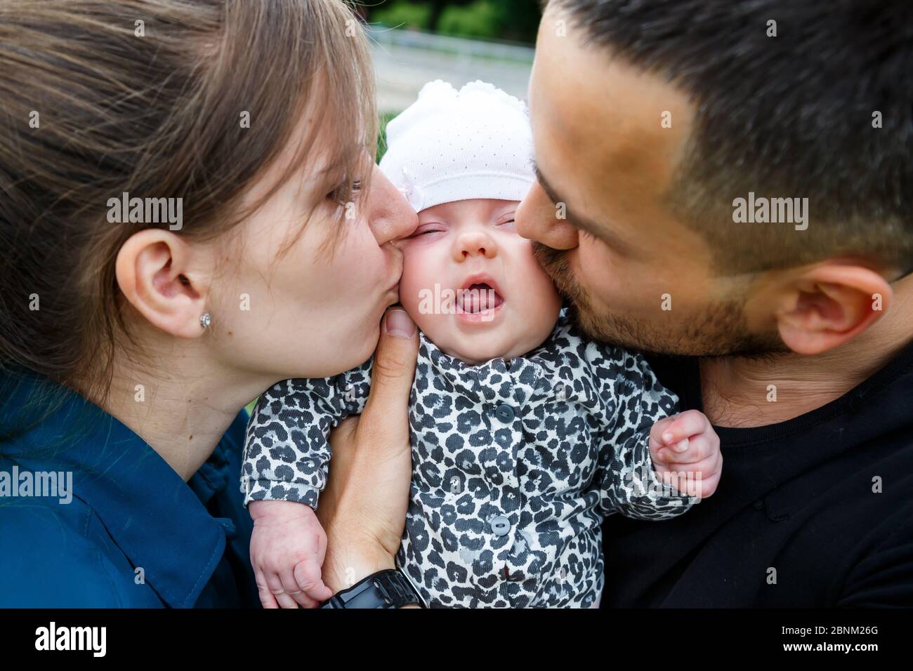 Loving Dad And Mom With Her Newborn Baby On Her Arms Beautiful Family With A Cute Sleeping New Born Child On Nature Outdoors Baby S First Week Of Li Stock Photo Alamy Loving Dad And Mom With Her Newborn Baby On Her Arms Beautiful Family With A Cute Sleeping New Born Child On Nature Outdoors Baby S First Week Of Li Stock Photo Alamy