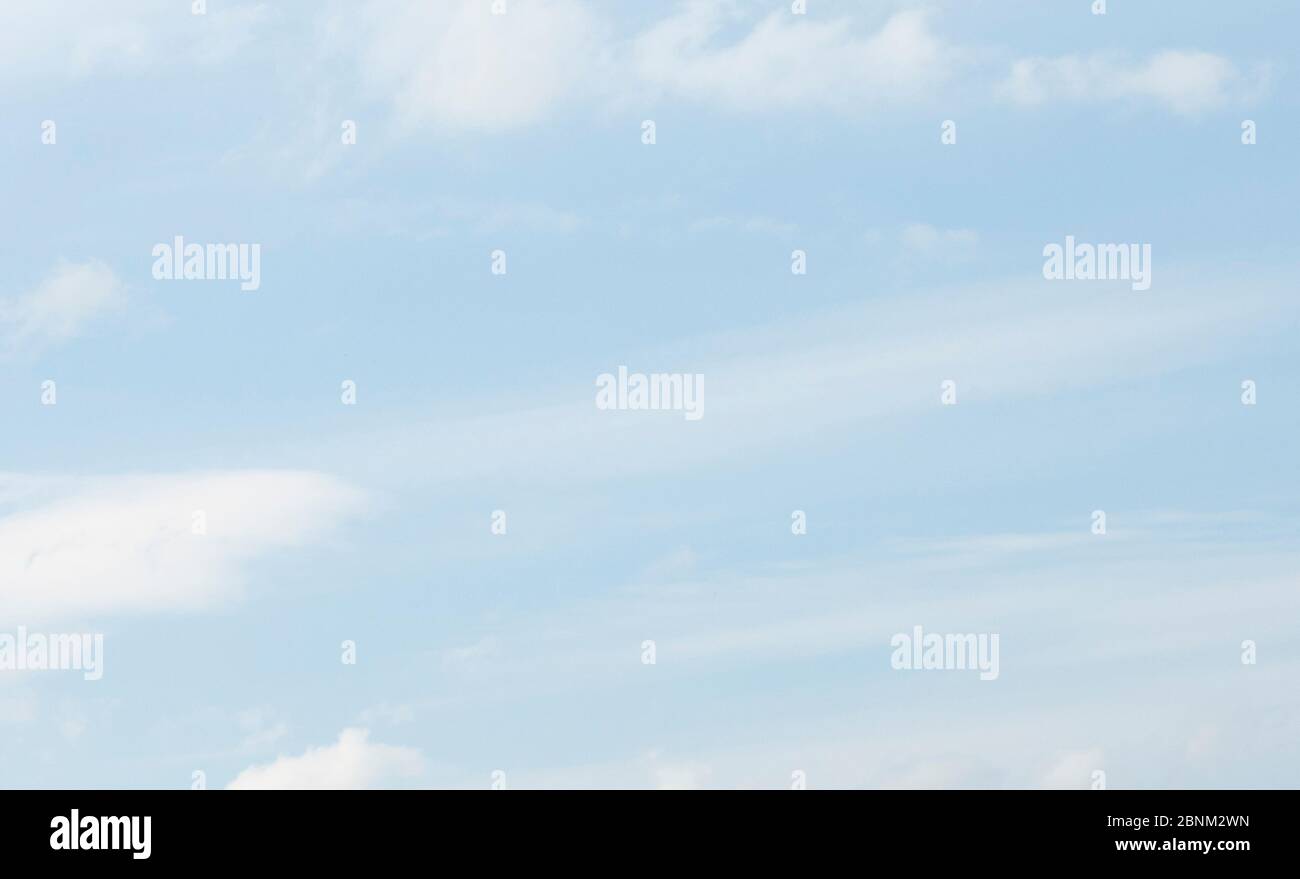 blue sky background with tiny clouds Stock Photo