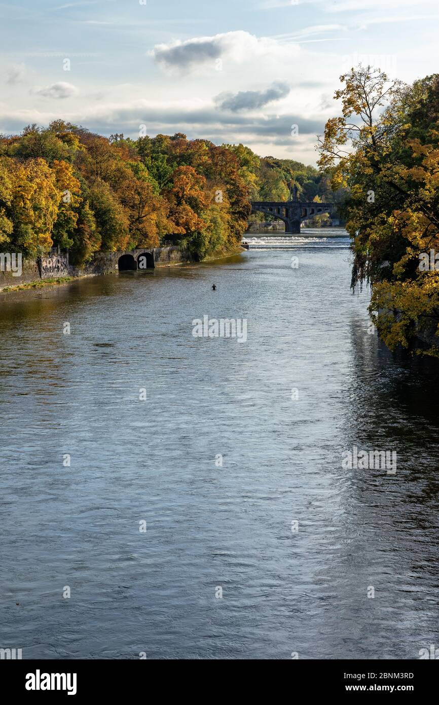Europe, Germany, Bavaria, Munich, view from the Luitpold Bridge onto the autumnal Isar and the bridge in front of the Maximilianeum Stock Photo