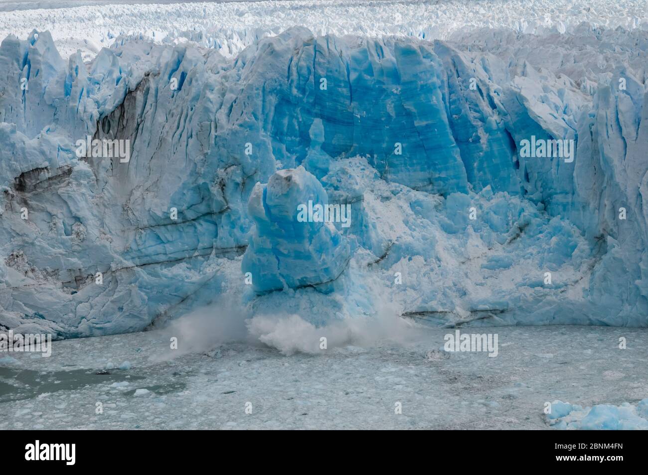Ice calving from Perito Moreno Glacier, Los Glaciares National Park, Santa Cruz, Patagonia, Argentina. February 2010. Stock Photo