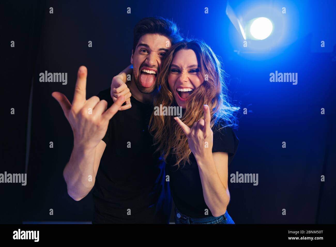 Image of emotional young loving couple having fun resting in a night ...