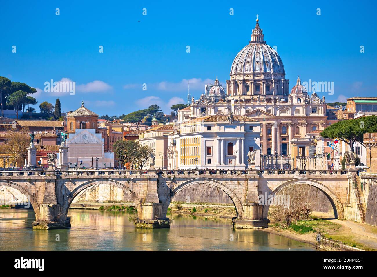 Rome and Vatican. Tiber river bridge od Saint Angelo and Basilica of Saint Peter in Rome view, eternal city in Italy Stock Photo