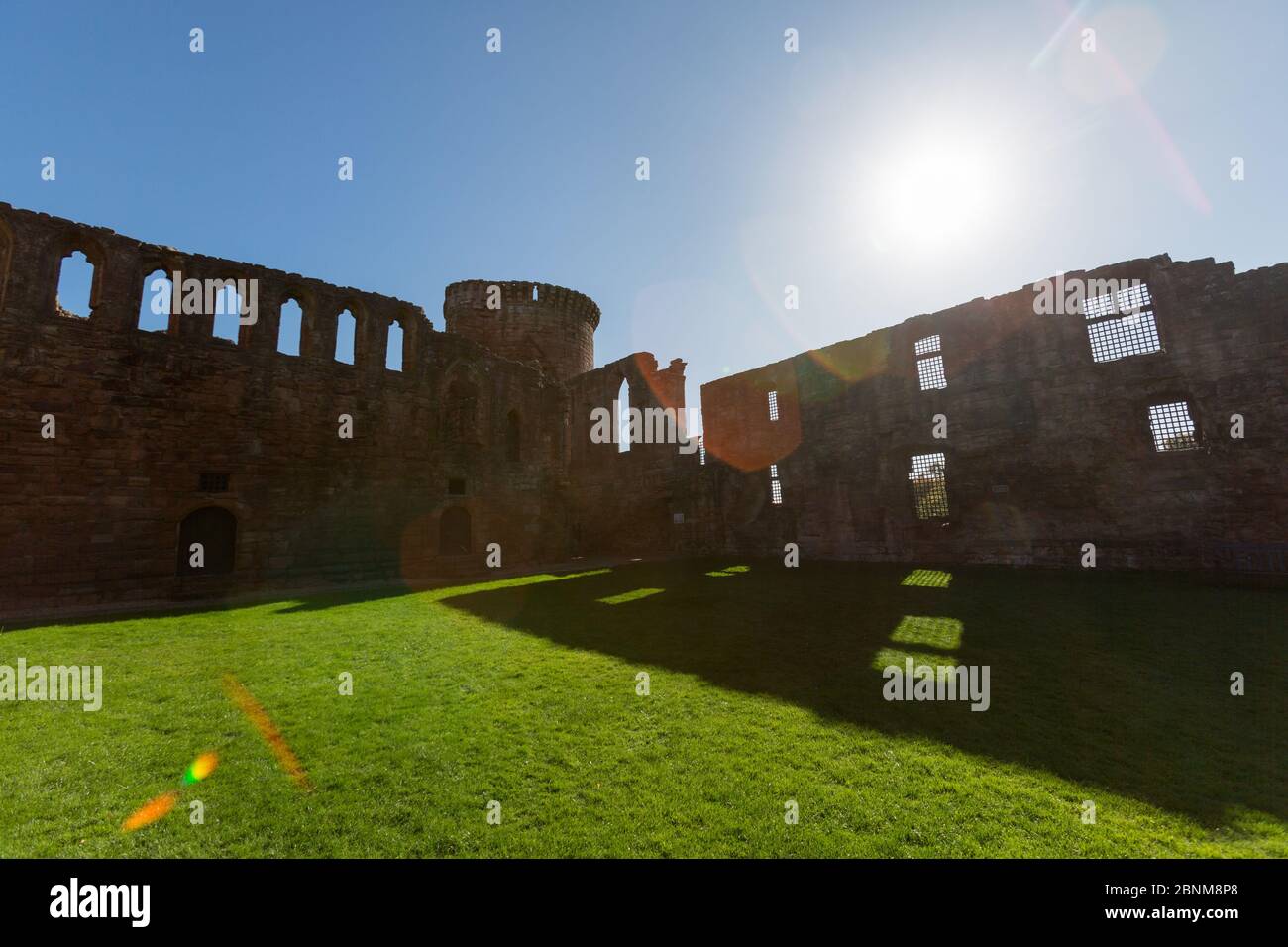 Bothwell Castle, Bothwell, Scotland. Silhouetted view of Bothwell Castle’s southern facade and south east tower. Stock Photo