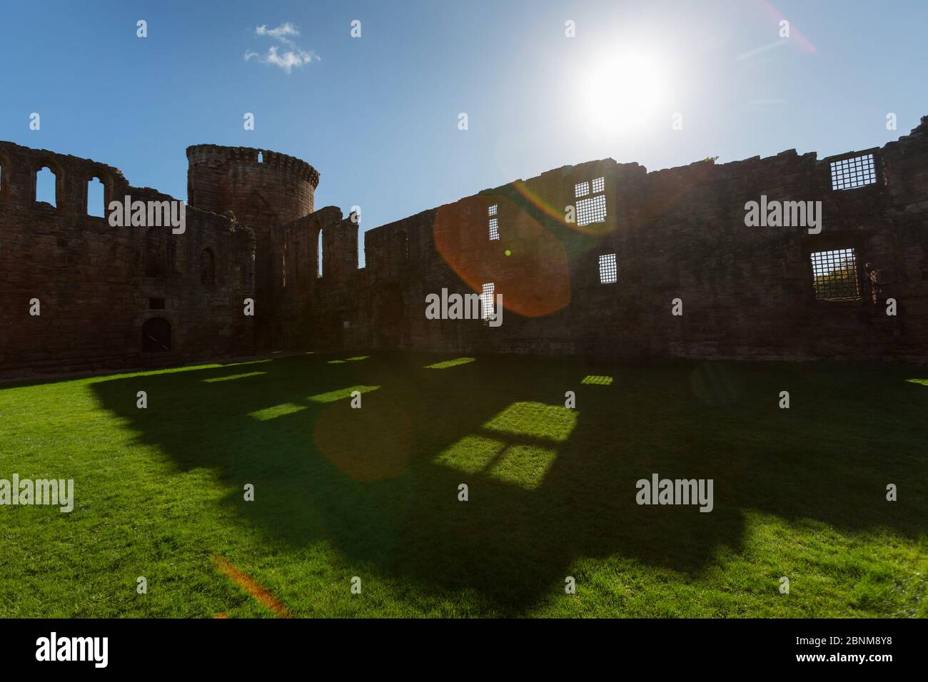 Bothwell Castle, Bothwell, Scotland. Silhouetted view of Bothwell Castle’s southern facade and south east tower. Stock Photo