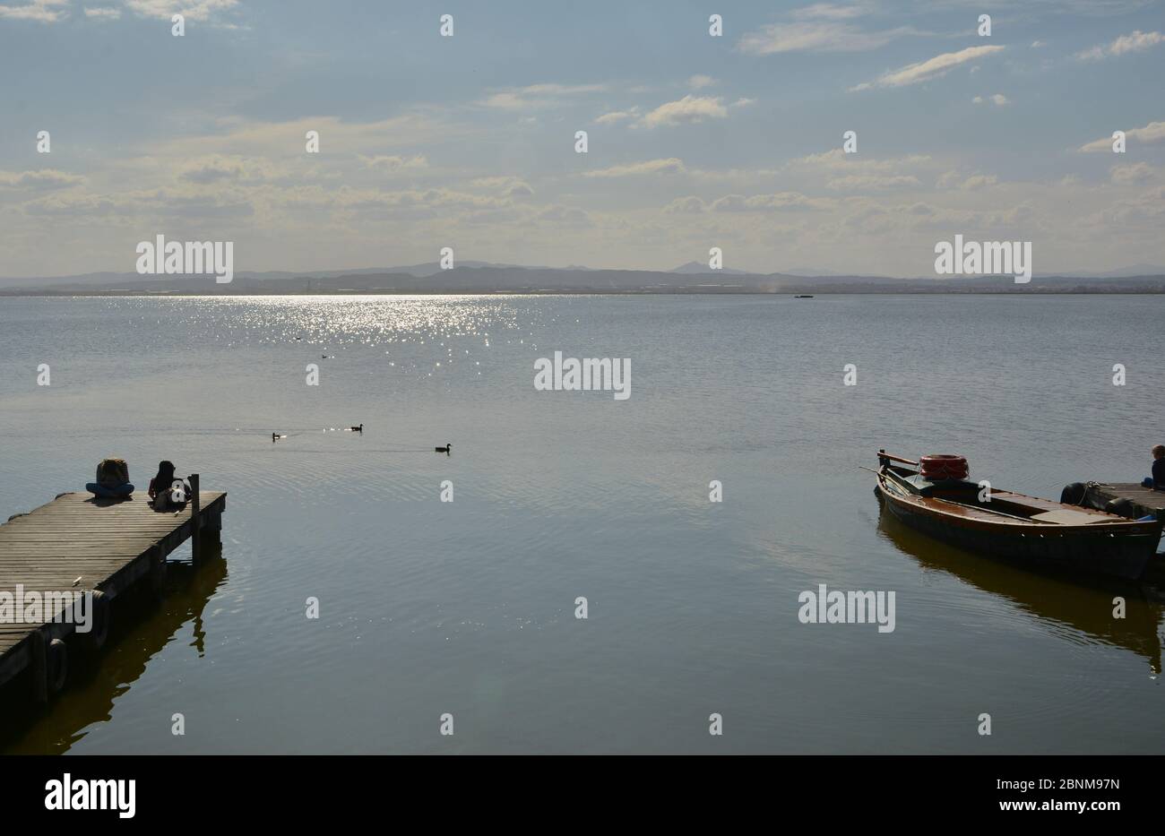 Two small boats pier hi-res stock photography and images - Alamy