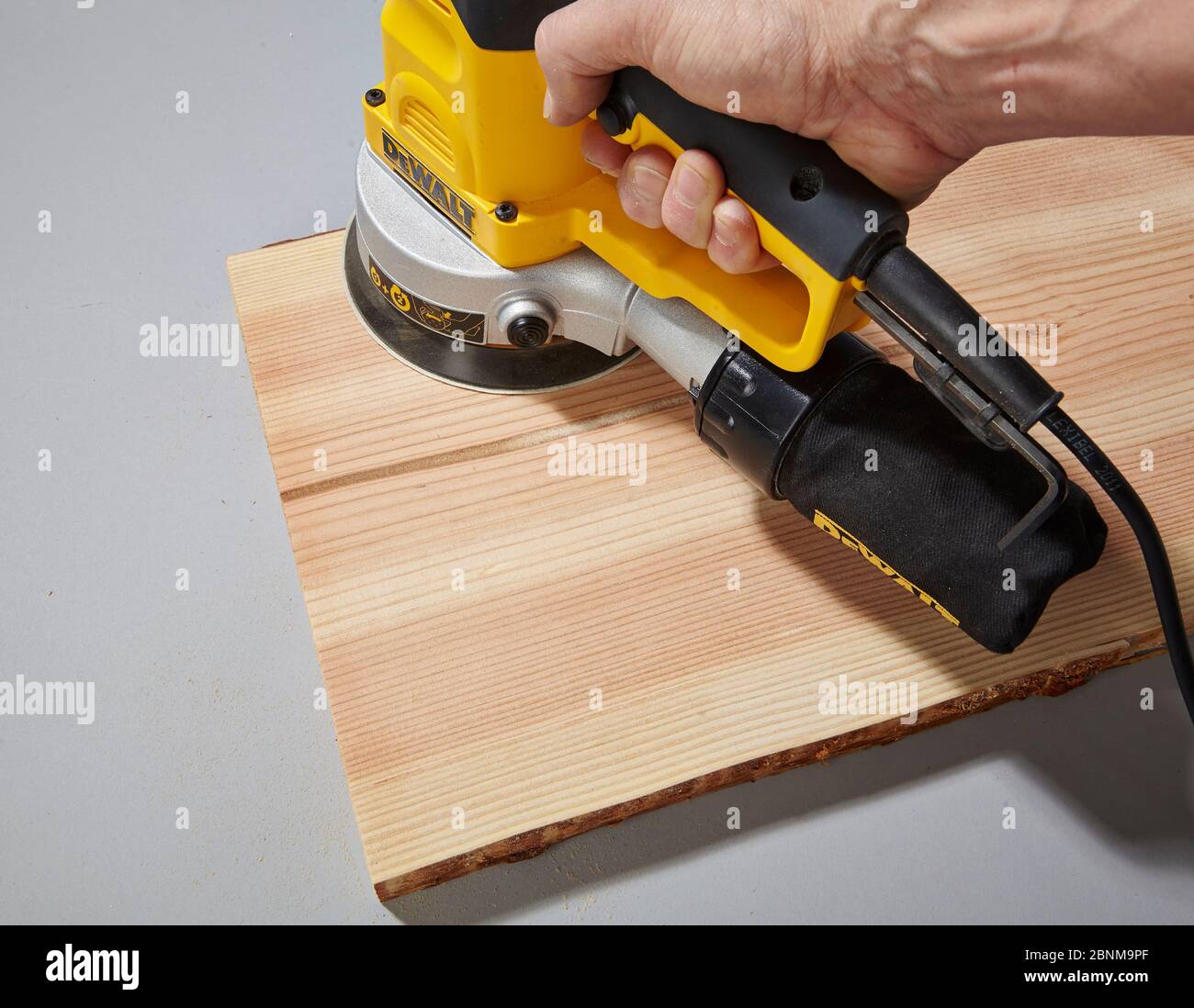 Construction of a wooden shelf, do-it-yourself production, step-by-step, step 1 sanding Stock Photo