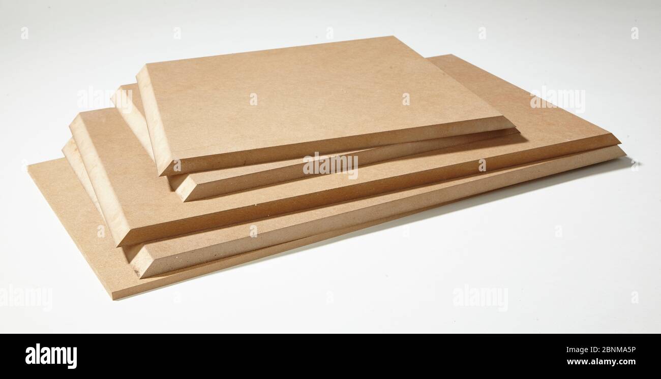 Construction of a shelf made of wood, Euro pallet, solid wood, MDF board; Do-it-yourself production, material photo of individual parts of the MDF board sawn to size Stock Photo
