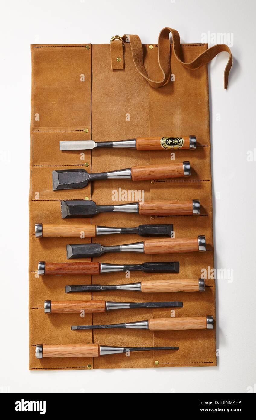a set of chisels with leather case, object recording on white, series tool for working wood from Japan, Japanese tool for wood working Stock Photo